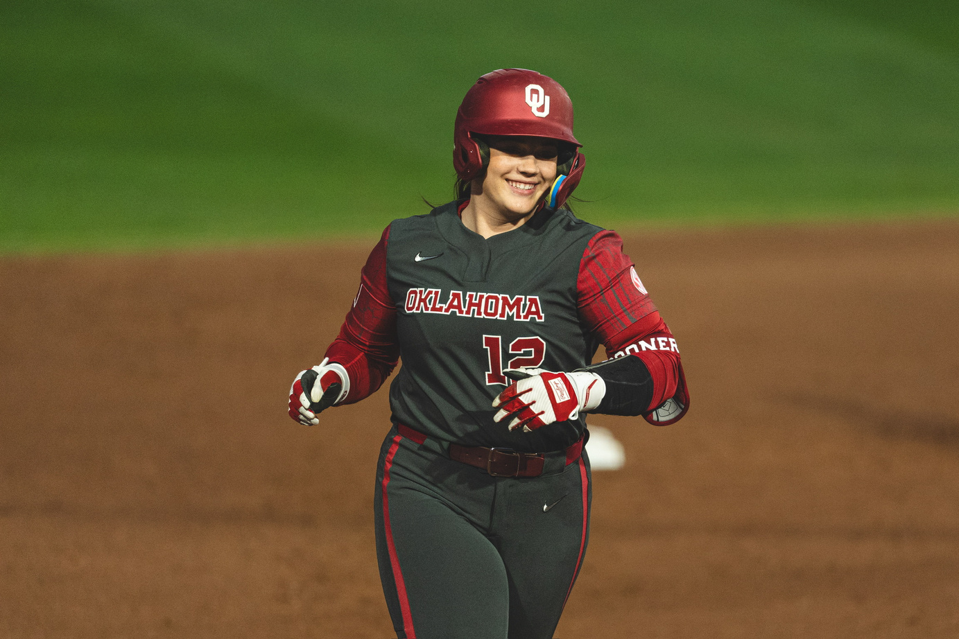 College softball athlete in an Oklahoma uniform