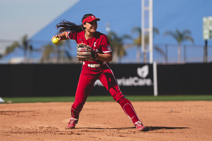 Nelly McEnroe-Marinas making a play on the softball field